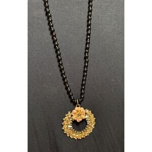 Y59  Gold Colored Circle on long black bead necklace
